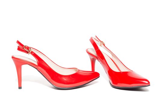 The photo shows women's red high-heeled shoes