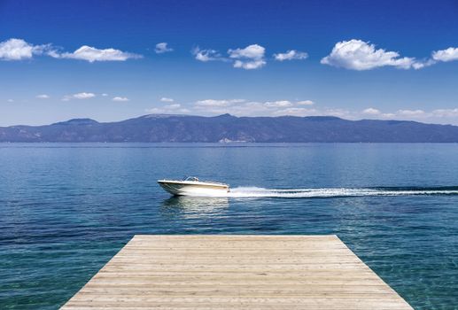 A family boating on Lake Tahoe near Sugar Pine Point during a summer afternoon. 