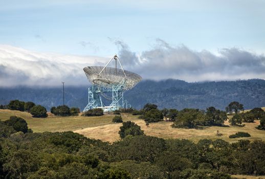 This image of Stanford Dish was taken at the old Leland Standord propert West of the campus. The property consists of rolling hills, trails, San Francisco bay and views of Silicon Valley. This shot was looking West look directly at the dish. The dish itself is a radio telescope used to explore the far reaches of space at Stanford University.