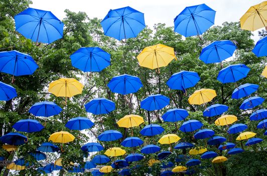 Blue and yellow umbrellas outdoor