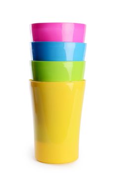 Plastic colorful cups isolated on white background