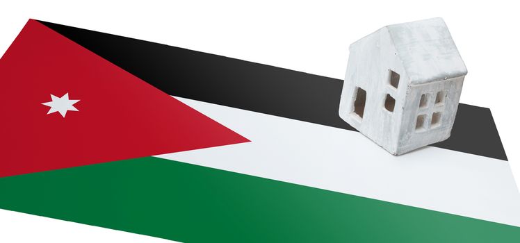 Small house on a flag - Living or migrating to Jordan