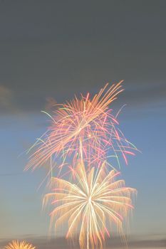 Holiday colorful fireworks background in vertical frame