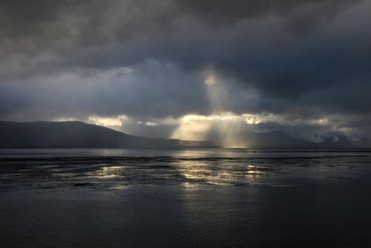 Beagle Channel with beautiful atmosphere of clouds and sun, Tierra del Fuego, Ushuaia, Argentina