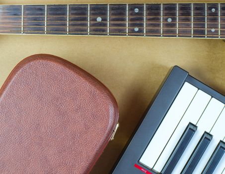 Electric guitar and keyboard  musical close-up