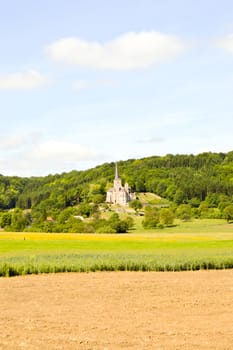 Cultures and church of Notre-Dame de Mont-Devant-Sassey in the department of the Meuse