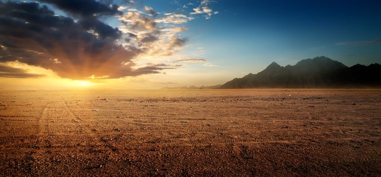 Egyptian rocky desert at sunset in summer
