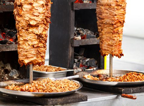 Closeup picture of stacked meat roasting, shawarma