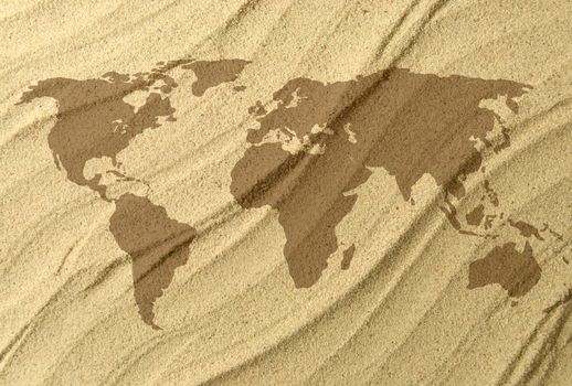 World map outline made from sand