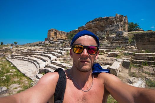 Portrait of man in ancient theatre in the city Hierapolis, near modern turkey city Denizli