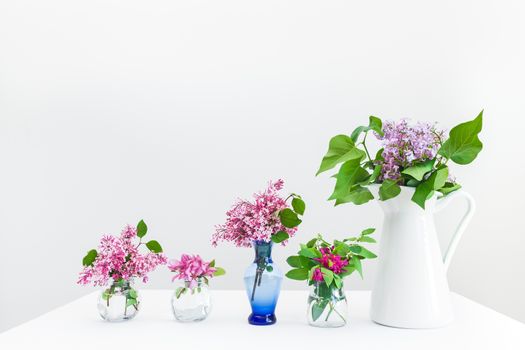 Bouquets of pink and purple spring flowers. Beautiful floral arrangement.