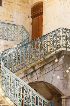 Vintage spiral wrought iron stairway of a church