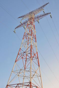 High voltage post and clear blue sky