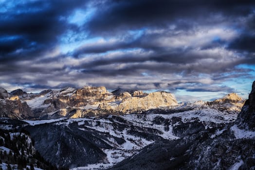 last sunny lights of the day in a beautiful sunset over the mountains of Alta Badia, Trentino-Alto Adige - Italy