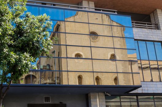 Italy: The Old church and modern building.