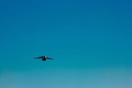 Passenger aircraft flying in the blue sky