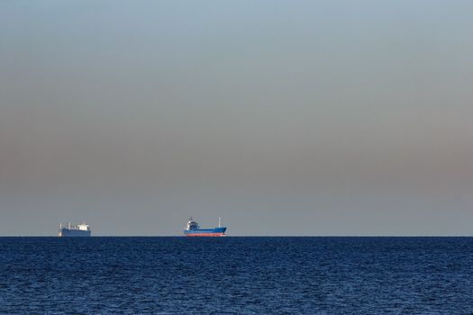 Blue cargo ship sailing from the Baltic sea