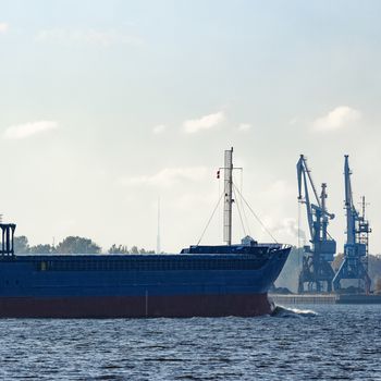 Blue cargo ship sailing from the Baltic sea