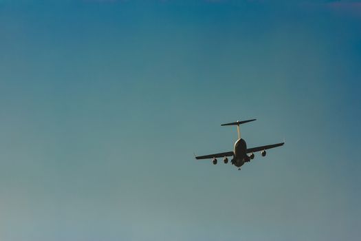 Passenger aircraft flying in the blue sky