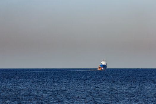 Blue cargo ship sailing from the Baltic sea