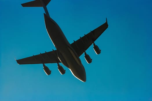 Passenger aircraft flying in the blue sky