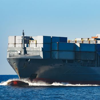 Large grey container ship moving from Baltic sea