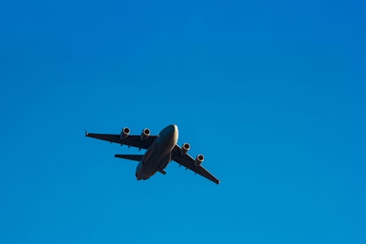 Passenger aircraft flying in the blue sky