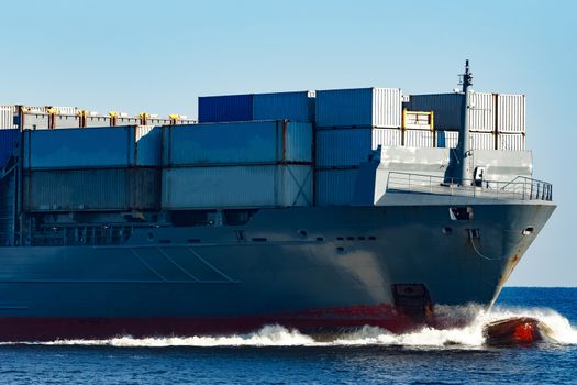 Large grey container ship moving from Baltic sea