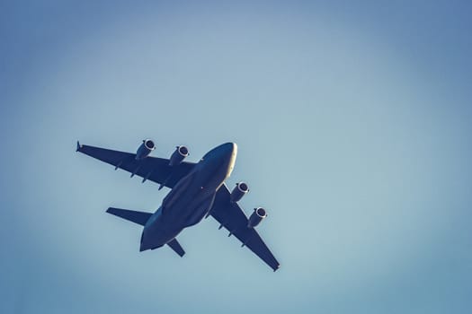 Passenger aircraft flying in the blue sky