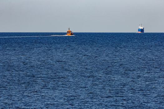 Blue cargo ship sailing from the Baltic sea