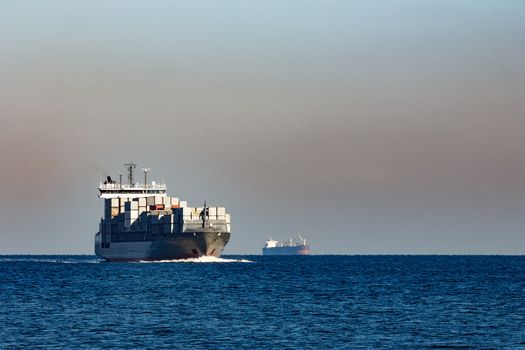 Large grey container ship moving from Baltic sea