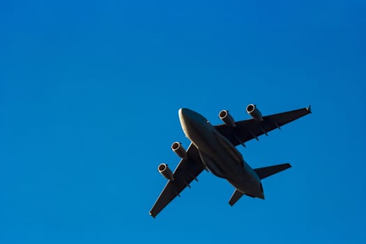 Passenger aircraft flying in the blue sky