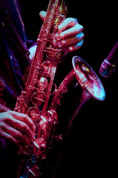 saxophone player in live perfomance, on stage