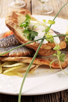 Pan fried trout fillets and baked potato