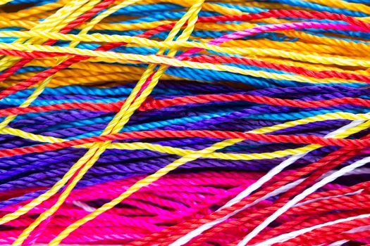 colorful thread close up background. clothes fabric