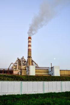 Pollution of atmospheric air from the chimneys of plants.
