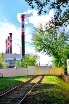Pollution of atmospheric air from the chimneys of plants.
