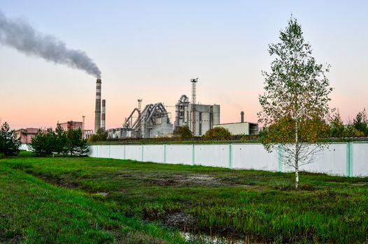 Pollution of atmospheric air from the chimneys of plants.