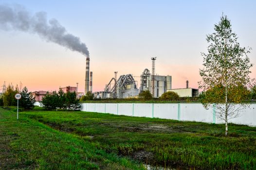 Pollution of atmospheric air from the chimneys of plants.