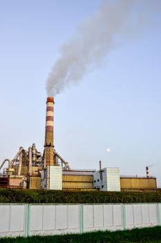 Pollution of atmospheric air from the chimneys of plants.