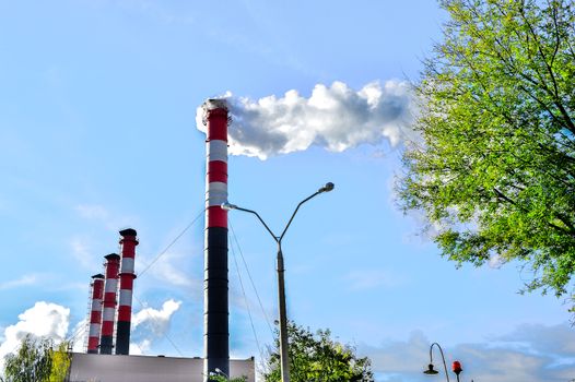 Pollution of atmospheric air from the chimneys of plants.