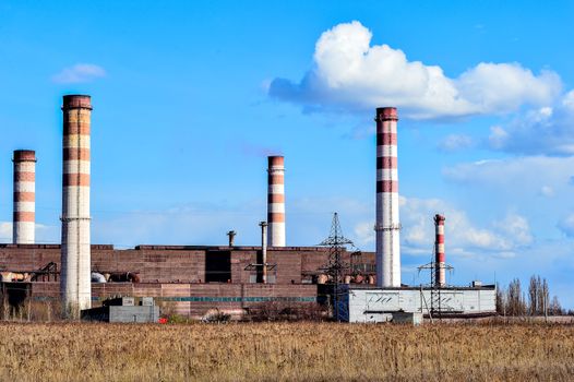 Pollution of atmospheric air from the chimneys of plants.