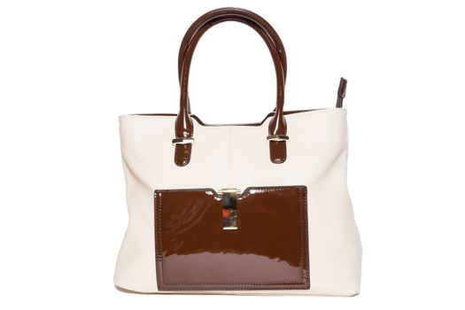 The photograph shows a female handbag on a white background