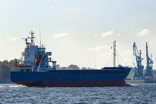 Blue cargo ship sailing from the Baltic sea