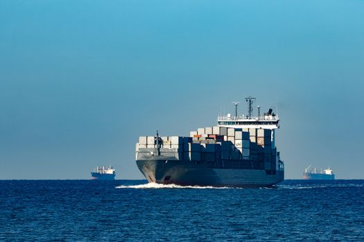 Large grey container ship moving from Baltic sea