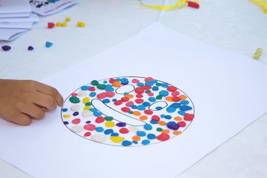 Kids playing with plasticine