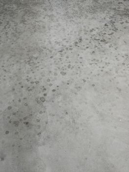 PHOTO OF RAINDROPS TEXTURE ON PLAIN CONCRETE BACKGROUND