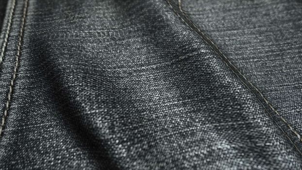 Realistic jeans waving in the wind. Abstract background Ultra-HD resolution. Close-up fabric texture. Seamless loop.