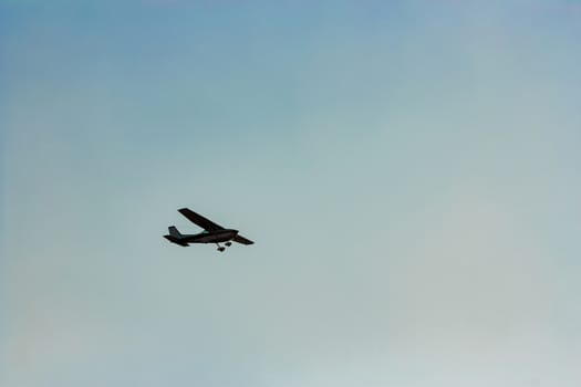 Passenger aircraft flying in the blue sky