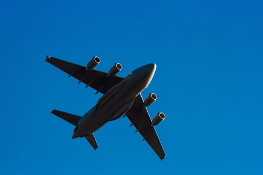 Passenger aircraft flying in the blue sky